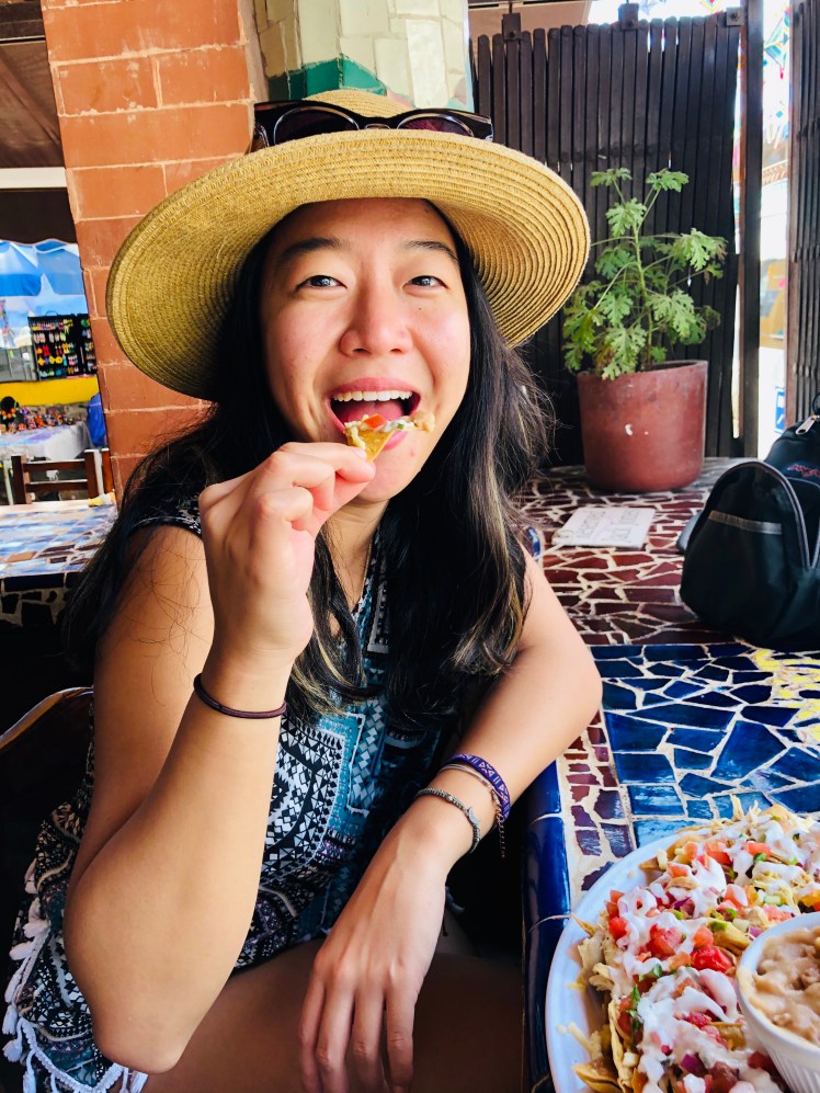 Girl eating nachos