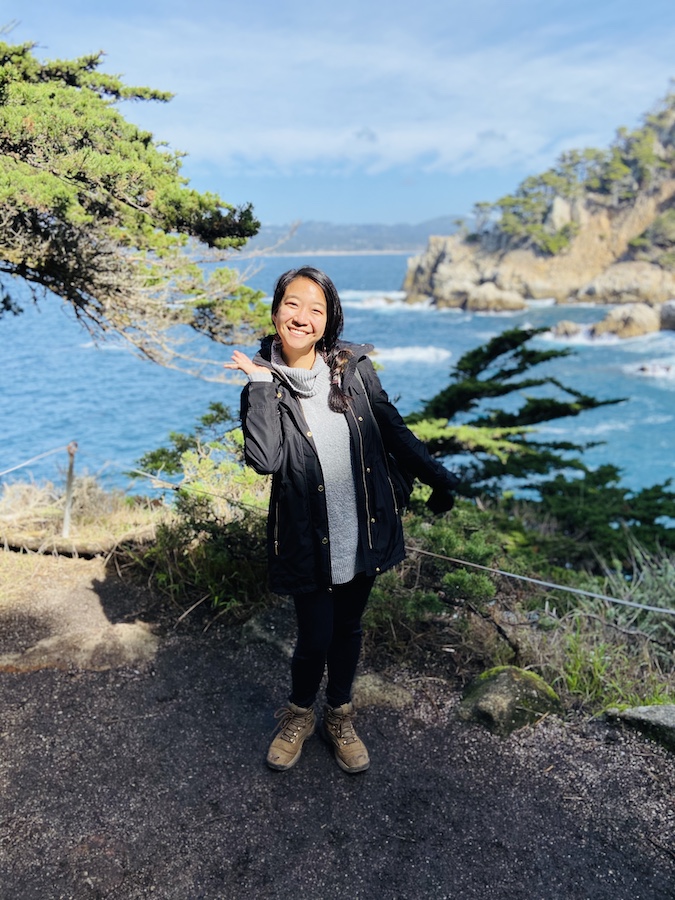 Charlotte posing on hiking trail