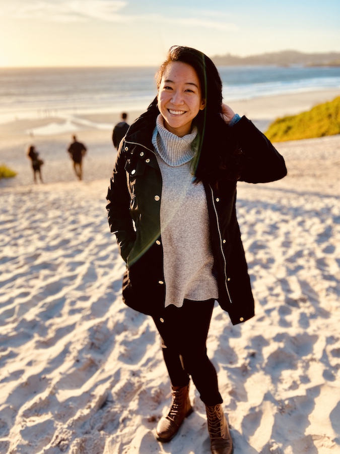 Girl posing on Carmel beach at sunset