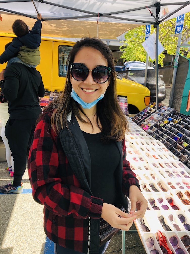 Shopping for sunglasses at Berkeley flea market