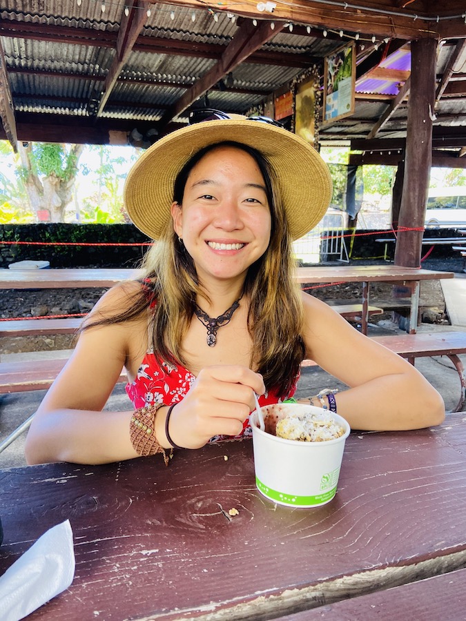 Eating acai bowl in shack in Puna district Hawaii