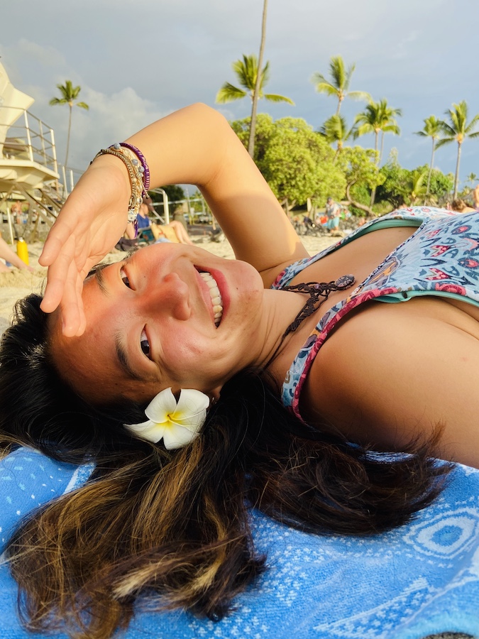 Laying on towel in Magic Sands Beach