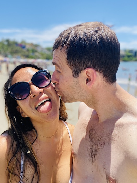 Couple kissing on cheek