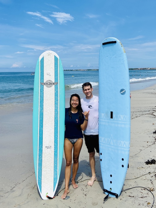 Couple surfing in La Lancha